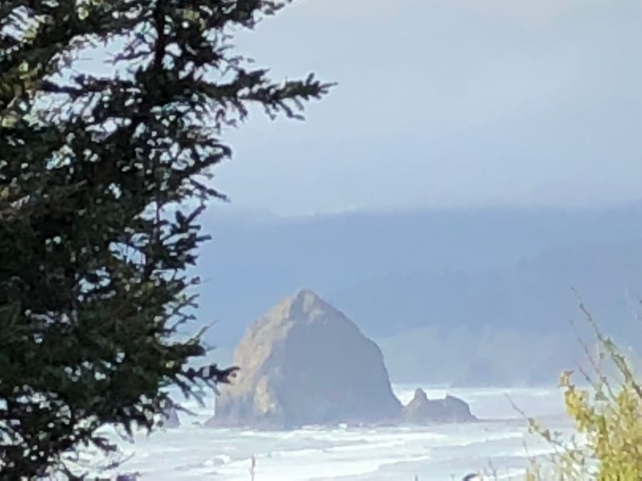 Haystack Rock in Fog. Cannon Beach (Haystack Rock area), Oregon